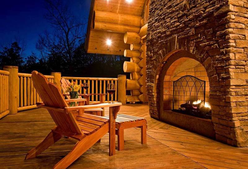 Page big outdoor fireplace in wooden house 2
